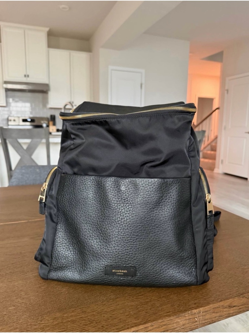 Storksak Black Nylon and Leather Designer Diaper Bag with Gold Accents